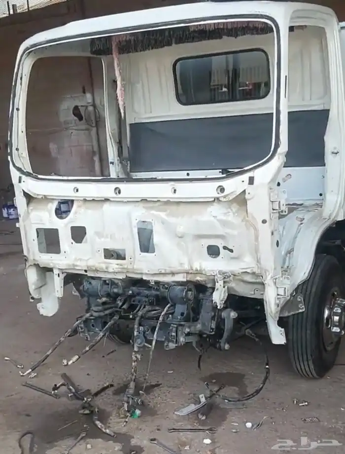 مركز ورشة سمكرة الدينات والباصات والسطحات وقطع غيارهت 20