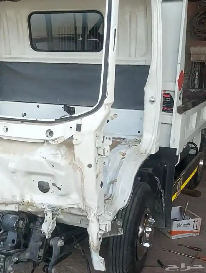 مركز ورشة سمكرة الدينات والباصات والسطحات وقطع غيارهت 22