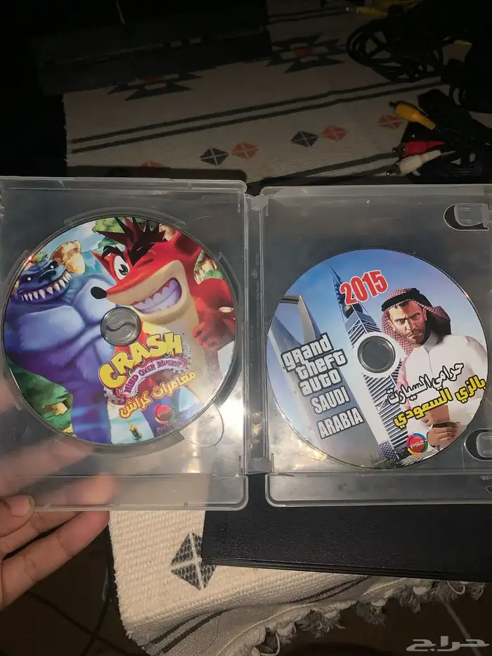 بلاستيشن 2 مستعمل مع قيرين وسلك الوان وشريطين كراش و قراند 3