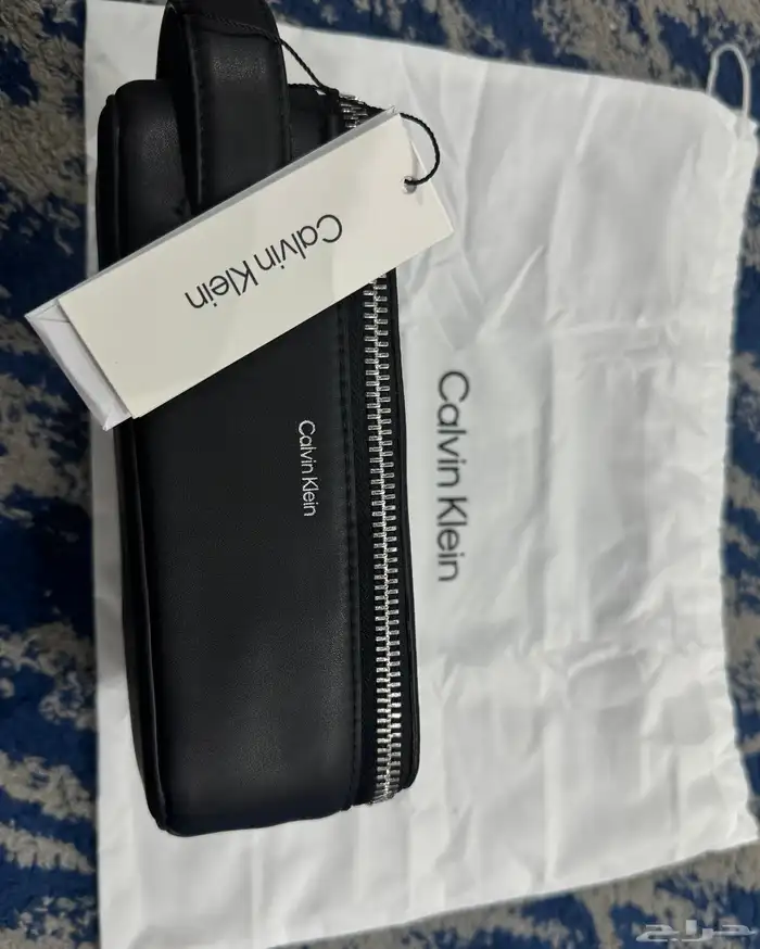 شنطة يد رجالي ماركة كلفن كلاين الأصلي جديدة 1