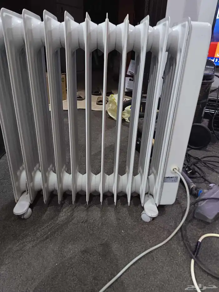 دفاية زيت هيلر ألماني 11 ريشة 220فولت َممتازة 9