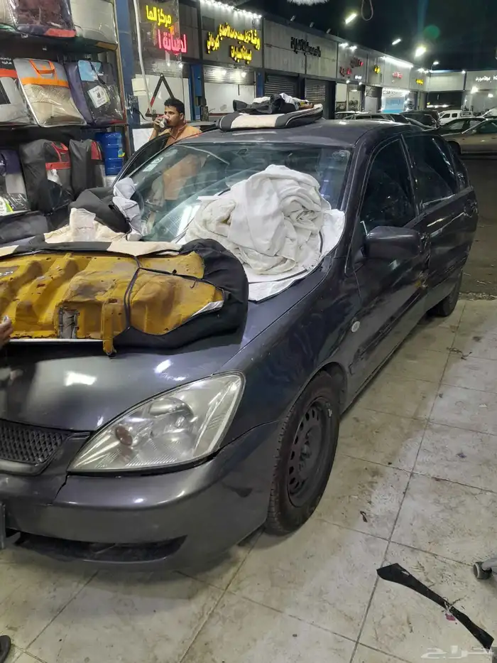 لانسر بومه قير اتومتك موديل 2009 1