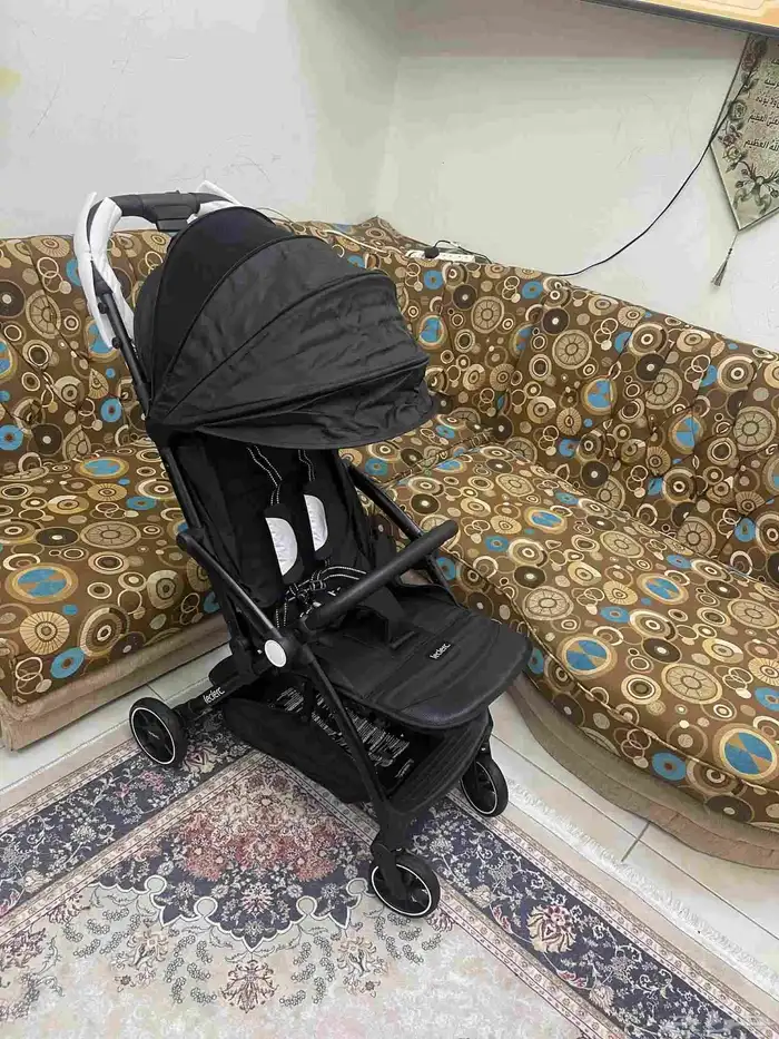 سترولر عربيه اطفال من مذركير جديده غير مستخدمه بالكارتون 3