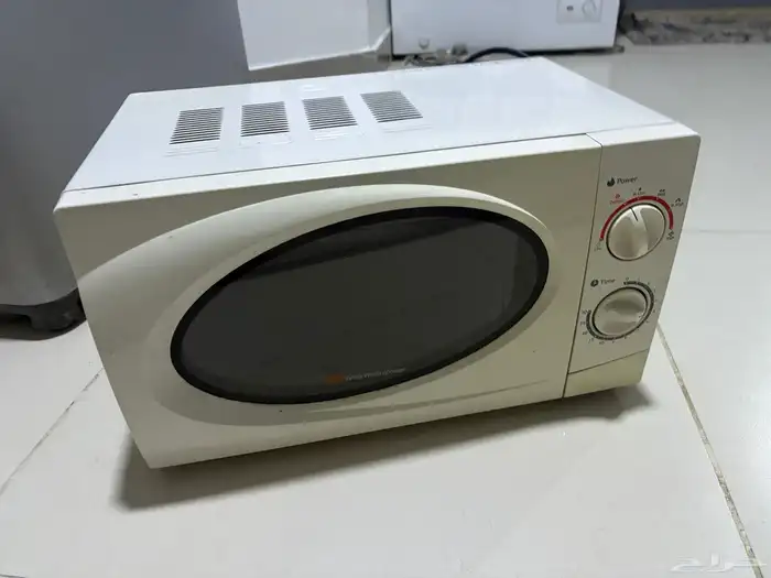 غساله اوتماتيك و ميكرويف 7