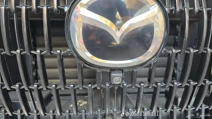 تلميع كميرا مزدا 2