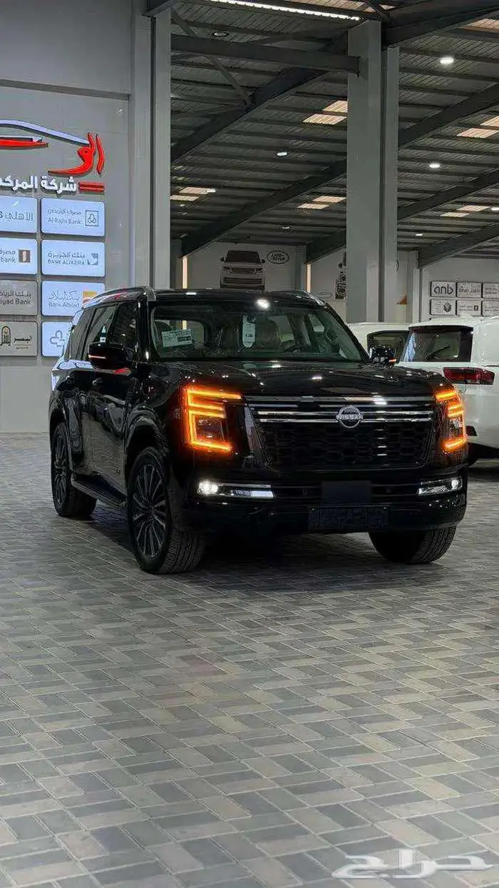 نيسان باترول بلاتينيوم فل كامل خليجي أسود داخل بيج 2026 0