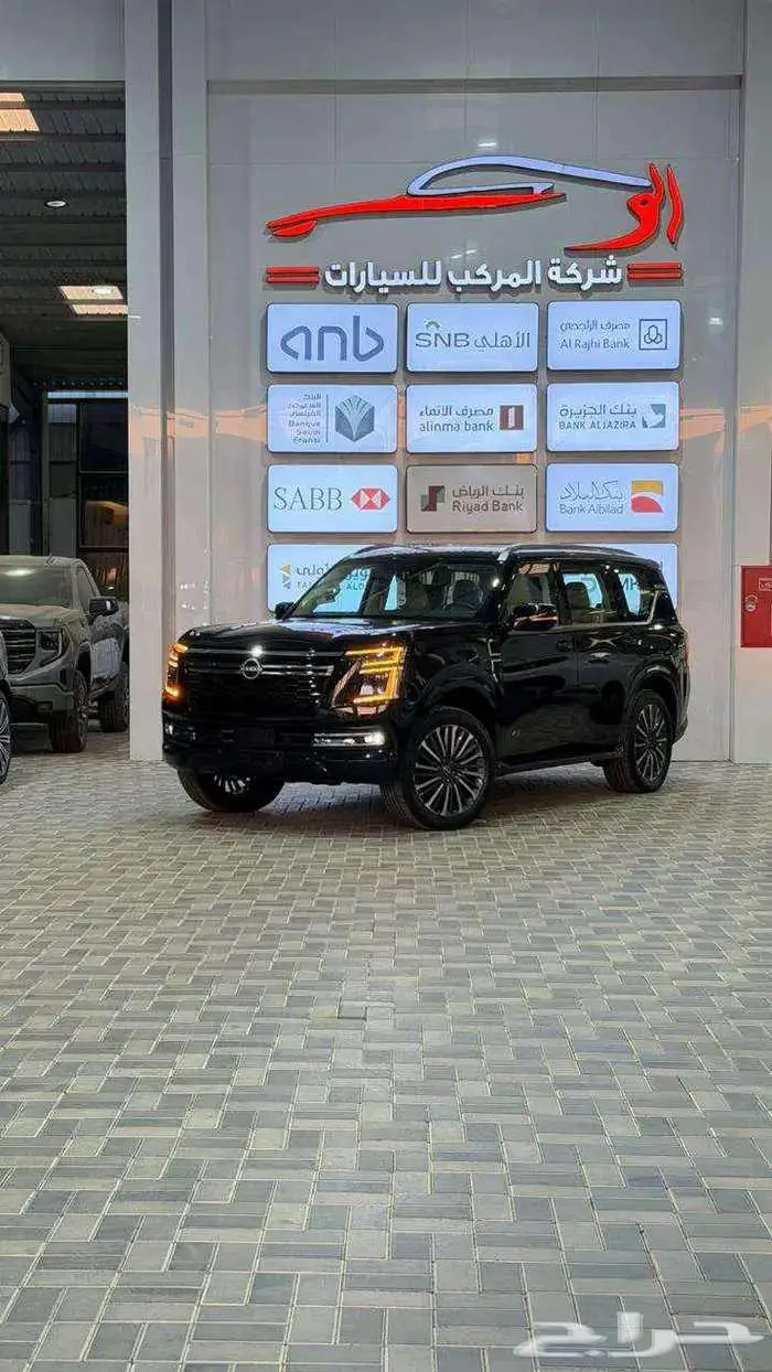 نيسان باترول بلاتينيوم فل كامل خليجي أسود داخل بيج 2026 1