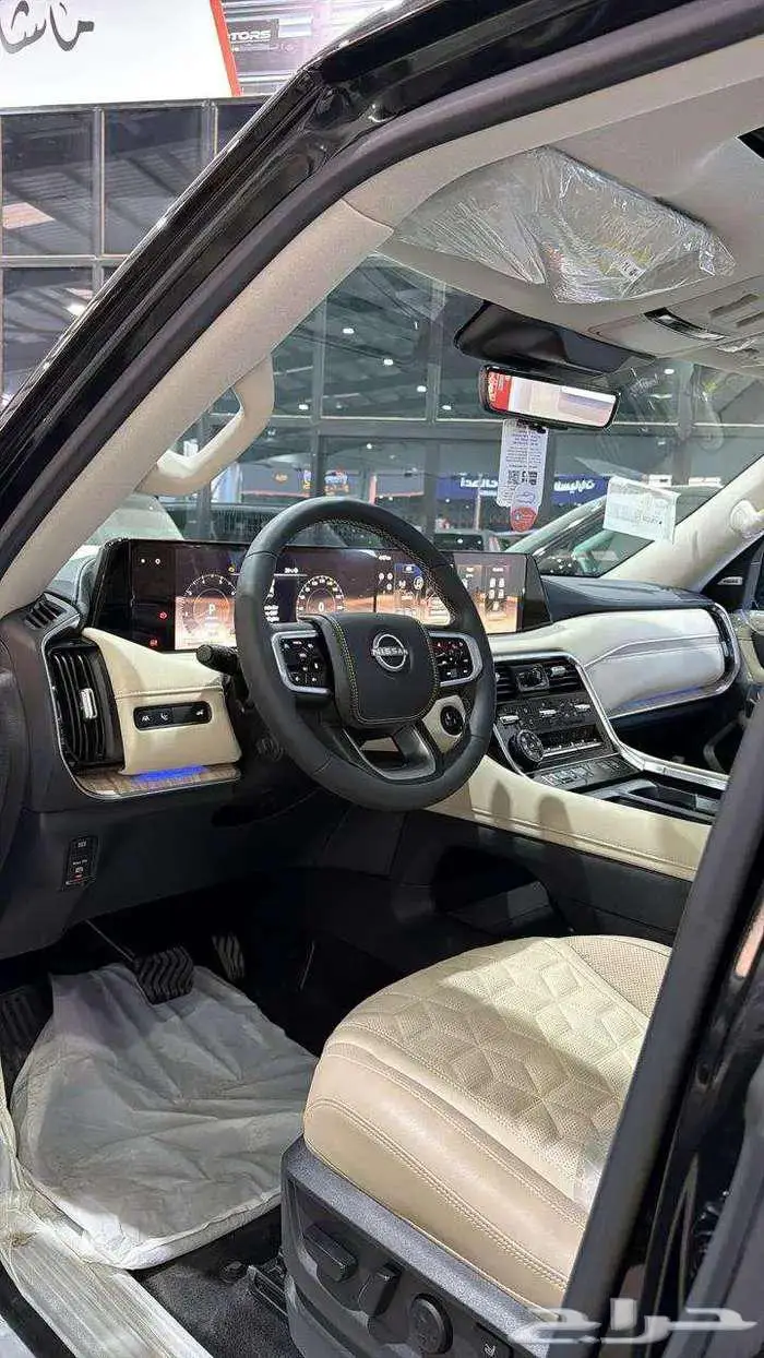 نيسان باترول بلاتينيوم فل كامل خليجي أسود داخل بيج 2026 3
