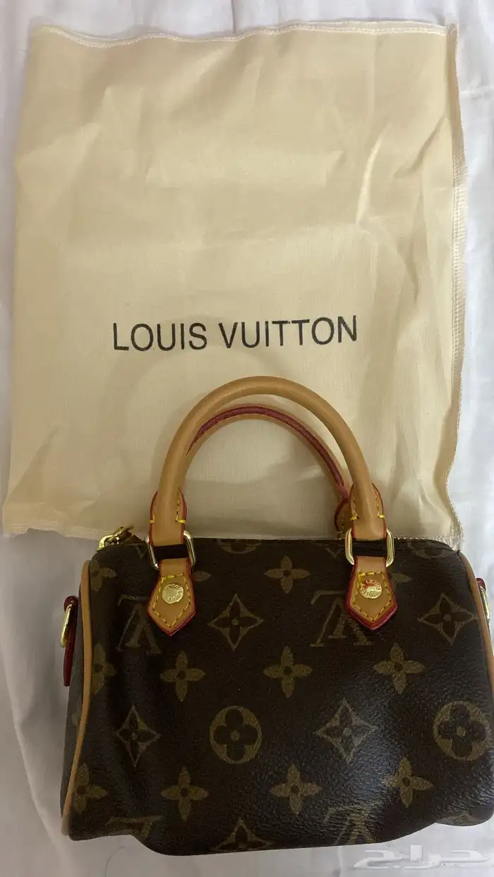 شنطة لويس فيتون السايز ميني مع تعليقه 1