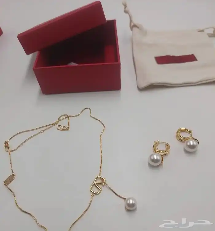 طقم فالنتينو . VALENTINO 2