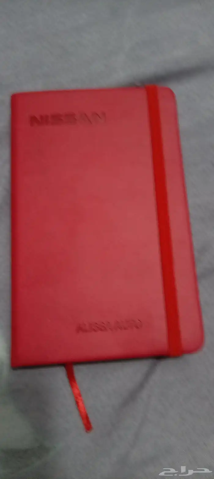 دفتر هدايا نيسان ددسن 2015 أصلي ما فيه ولا خط 0
