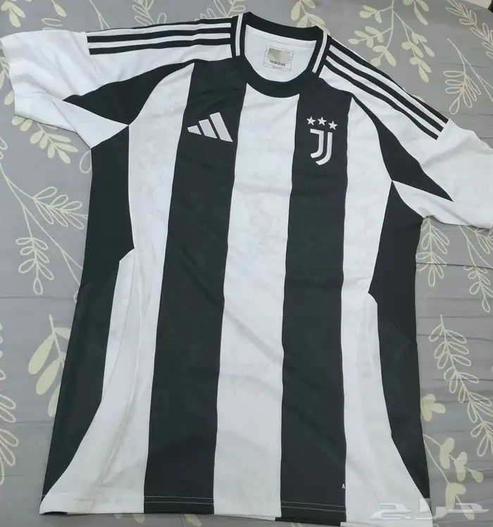 قميص موقع من تريزيغيه 1