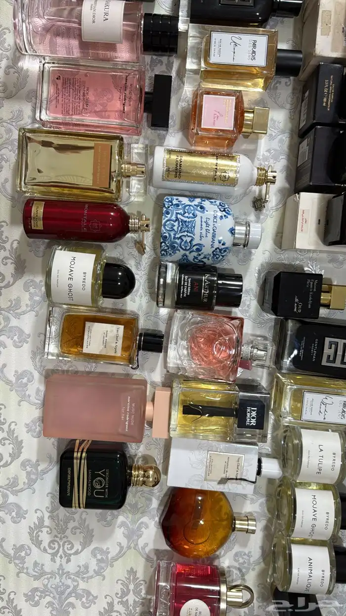 عطور اصليه ماركات بكراتين وبعضها بدون كراتين بربع القيمه 26