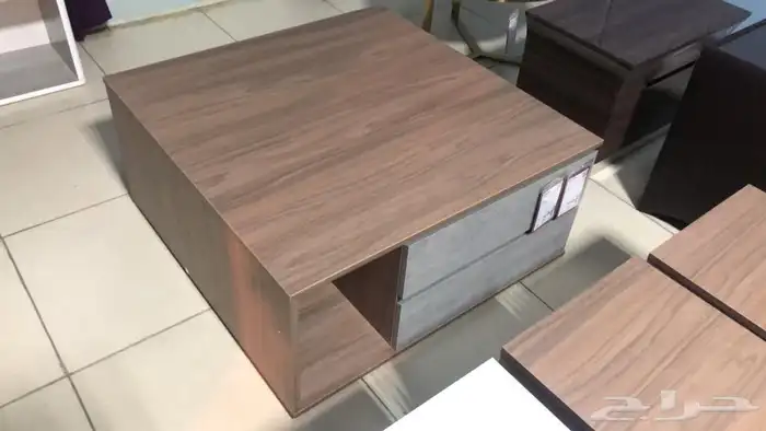 طاولة قهوة من هوم سنتر وطاولة طعام من ساكو 0