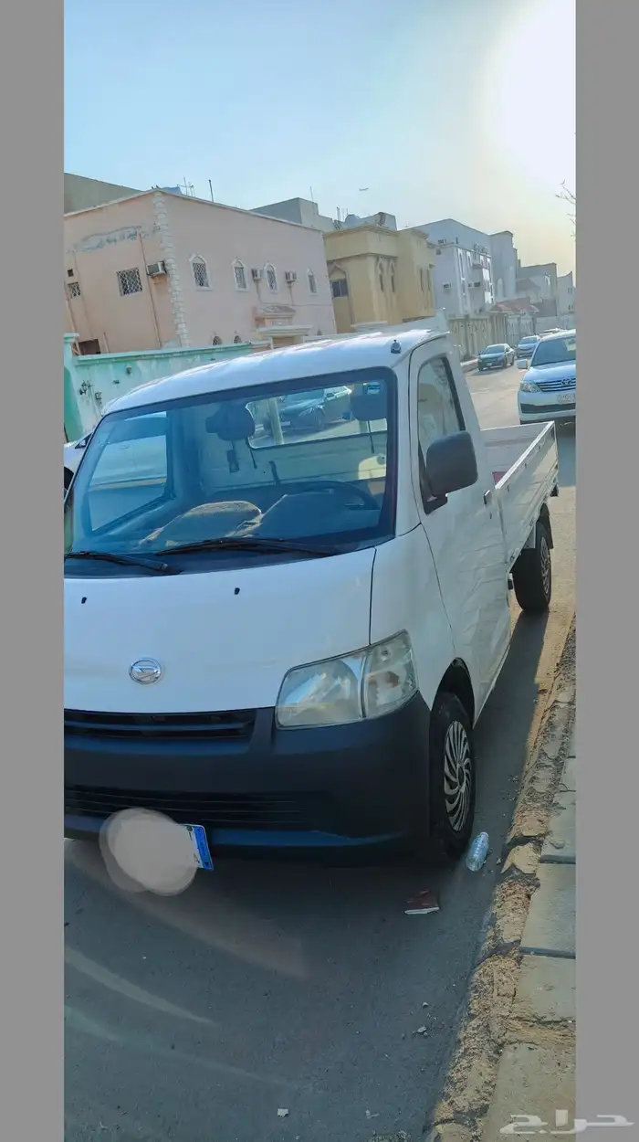 دباب دايهاتسو بيك اب موديل 2012. الون الابيض. 2