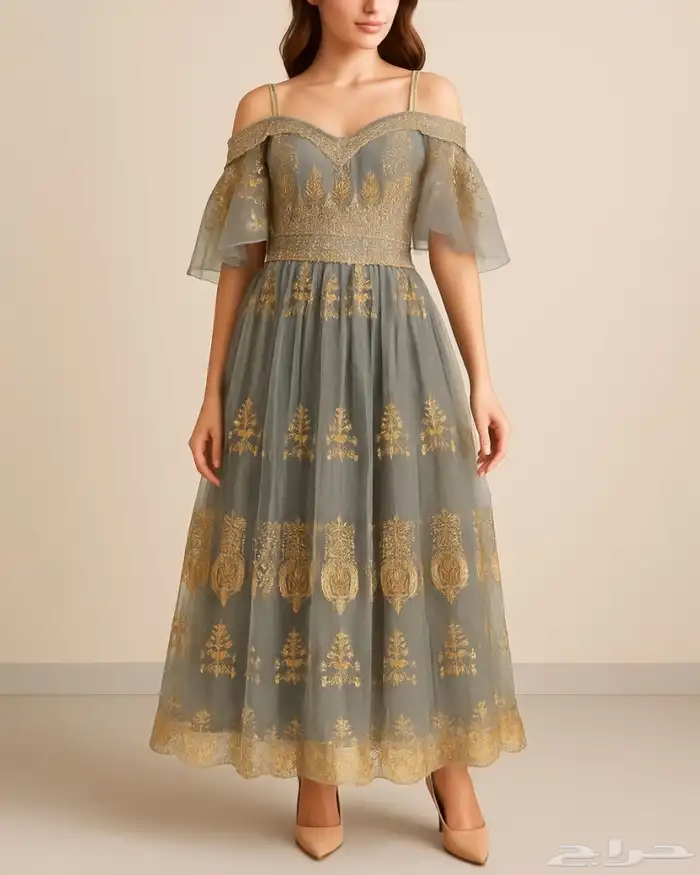 فستان للسهرات مطرز بنقوش ذهبية 2