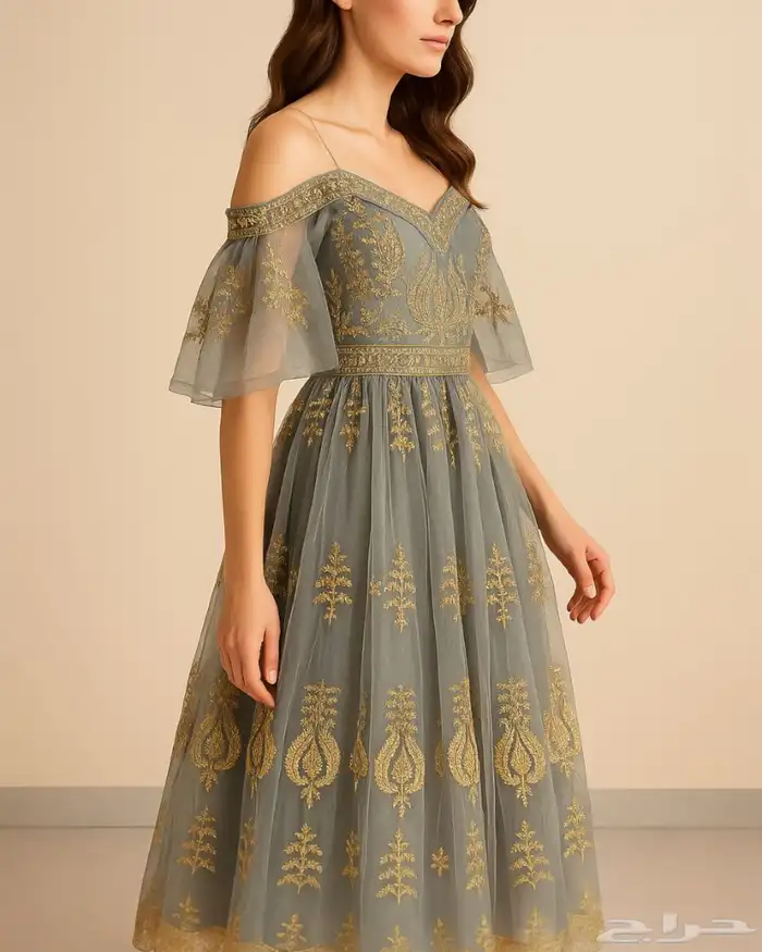 فستان للسهرات مطرز بنقوش ذهبية 1