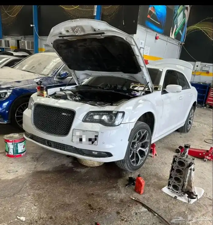 مركز صيانة دوج تشارجر توضيب مكائن تغيير تكيات صيانة ميزان 39