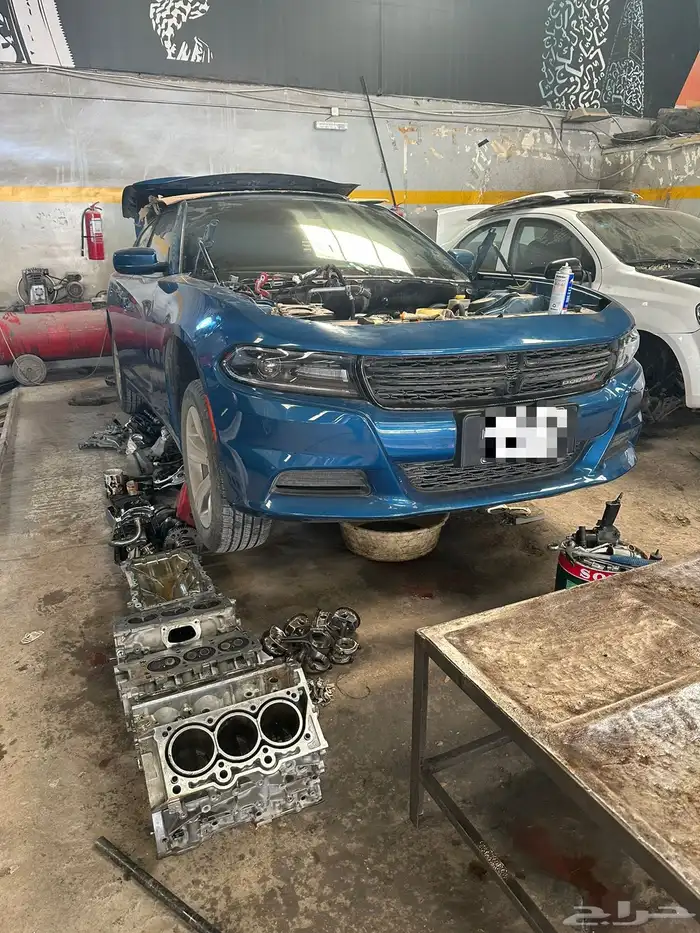 مركز صيانة دوج تشارجر توضيب مكائن تغيير تكيات صيانة ميزان 48