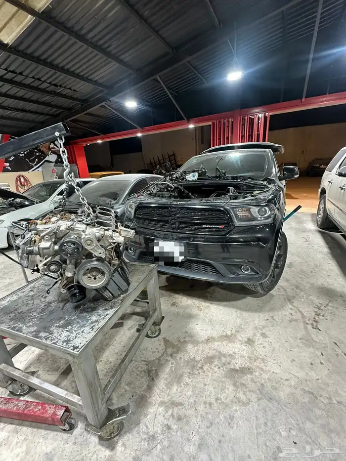 مركز صيانة دوج تشارجر توضيب مكائن تغيير تكيات صيانة ميزان 42