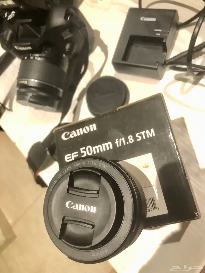 كاميرا كانون EOS 4000D بكامل اغراضها 3