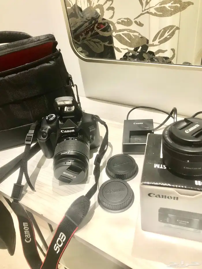 كاميرا كانون EOS 4000D بكامل اغراضها 0