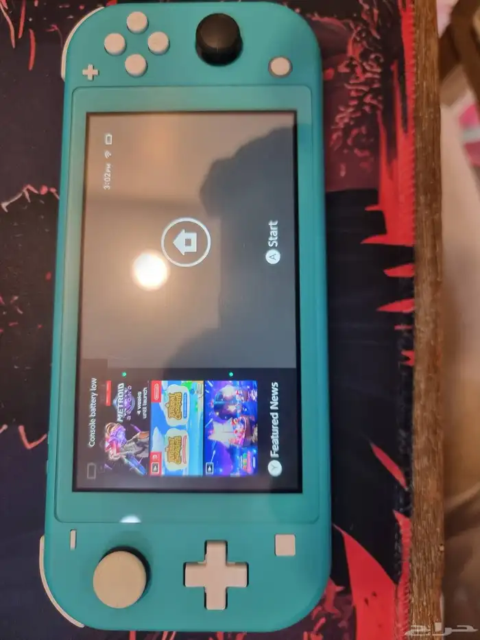 نينتندو سويتش لايت مع ملحقاته وكرت داكرة 256 وشاحن الاصلي 0