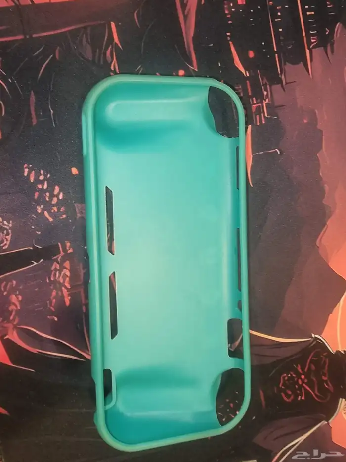 نينتندو سويتش لايت مع ملحقاته وكرت داكرة 256 وشاحن الاصلي 4