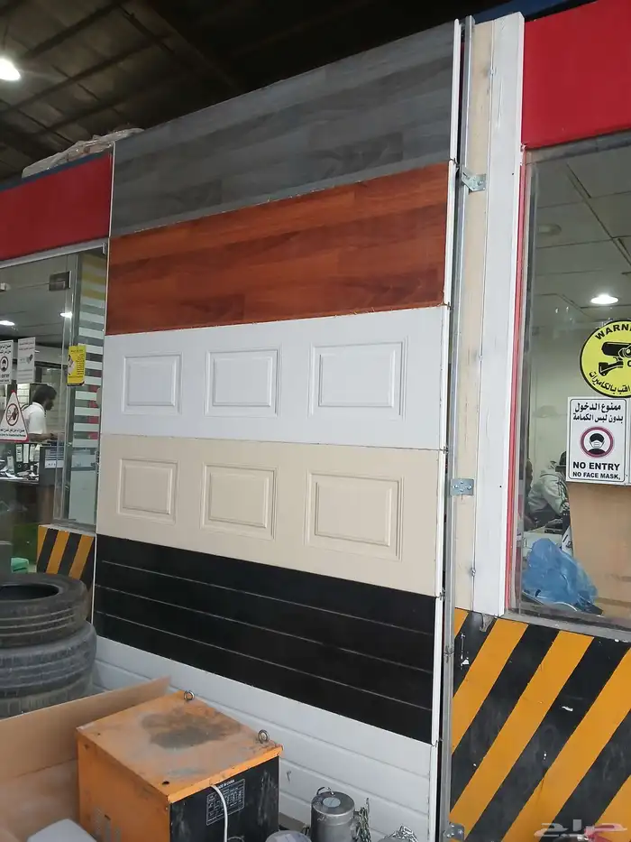 توريد وتركيب وصيانه الابواب الاوتوماتيكيه الكراجات 0