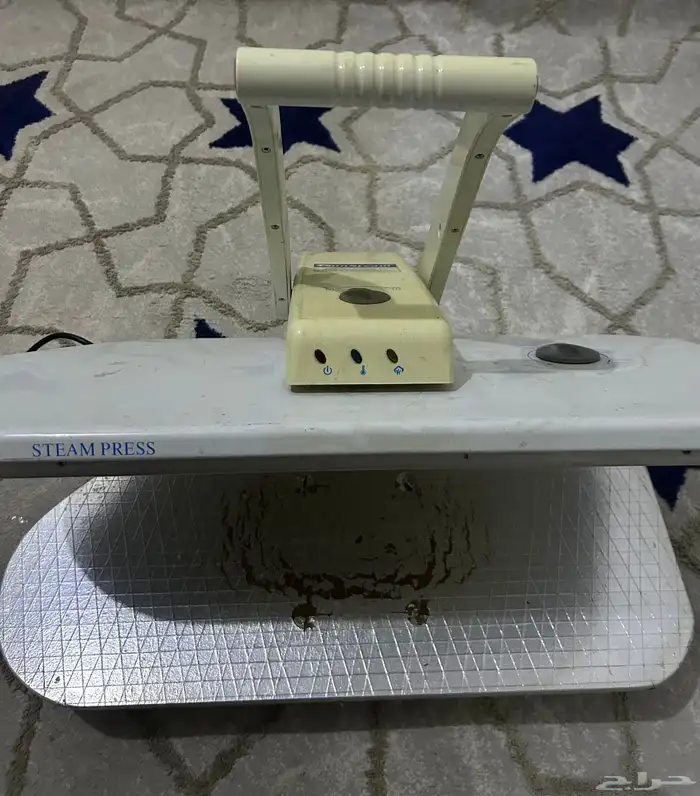 مكواه ملابس 0