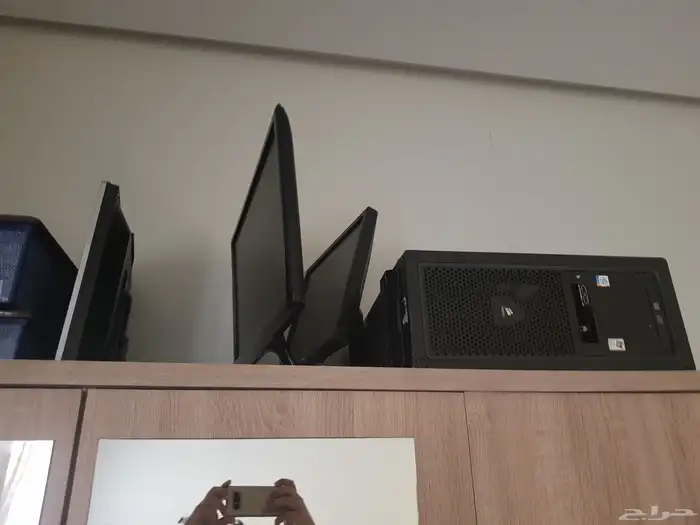 2 computer and 3 monitors 0