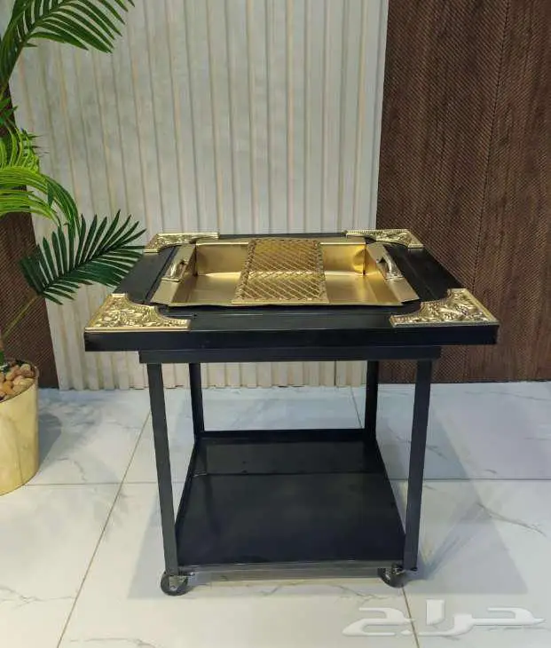 منقل حطب مربع منقوش اسود بذهبي 58 58 سم 190 ريال 1