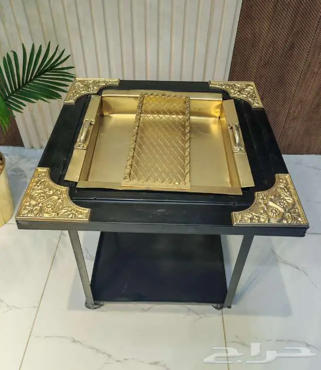 منقل حطب مربع منقوش اسود بذهبي 58 58 سم 190 ريال 3