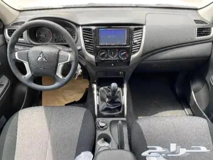 ميتسوبيشي L200 دبل ديزل عادي 2023 6