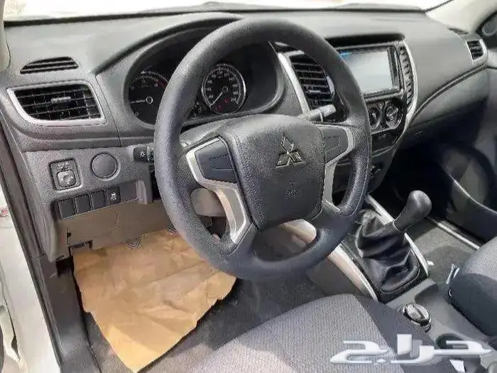 ميتسوبيشي L200 دبل ديزل عادي 2023 7