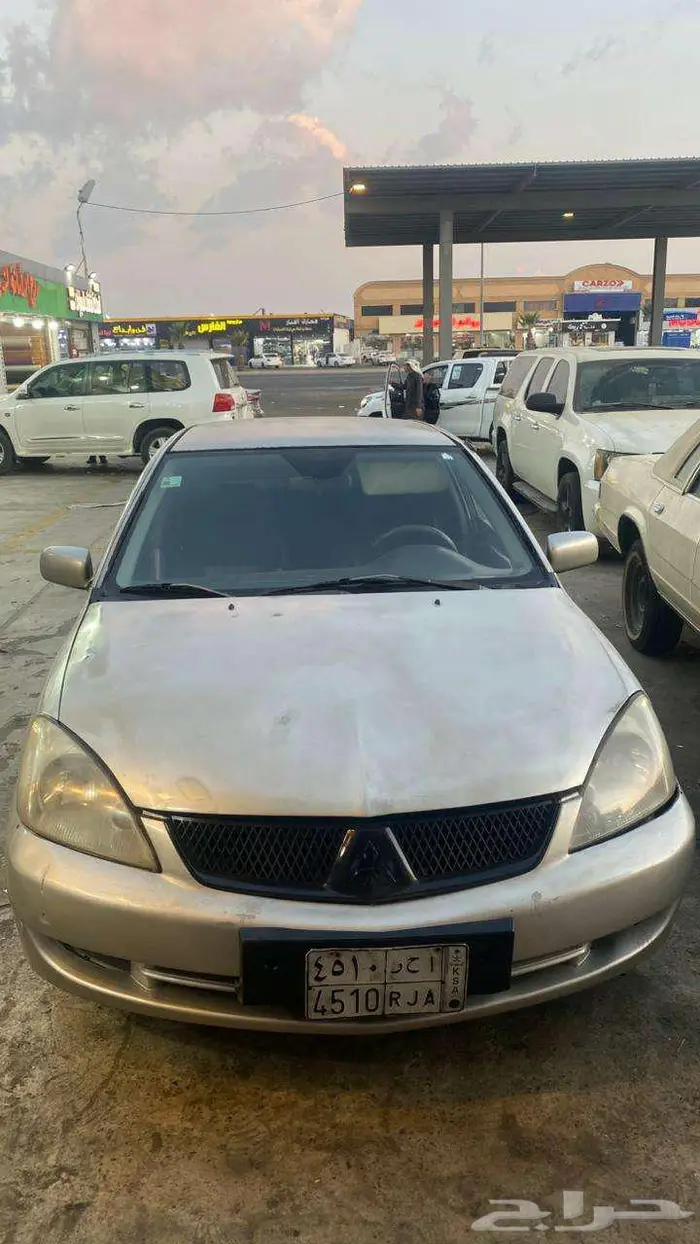 سيارة لانسر مستوبيشي للبيع 0