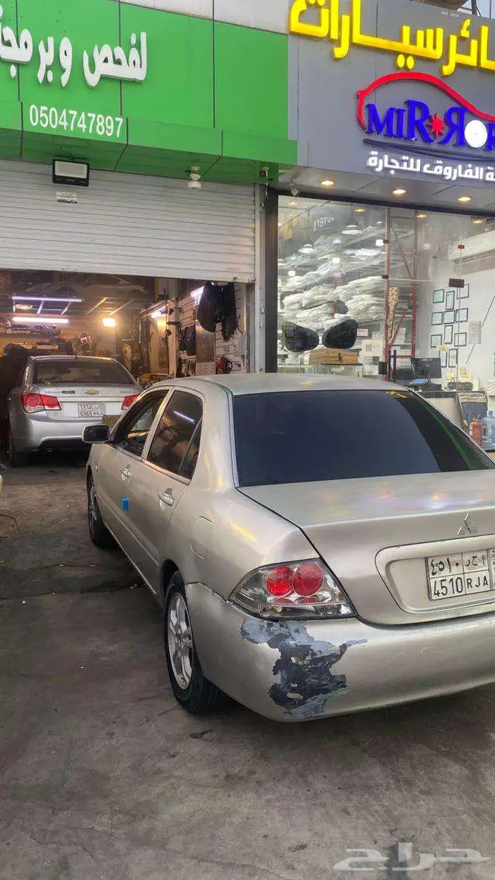 سيارة لانسر مستوبيشي للبيع 5