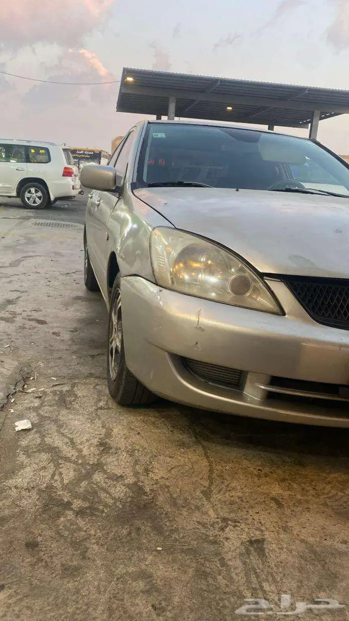 سيارة لانسر مستوبيشي للبيع 3