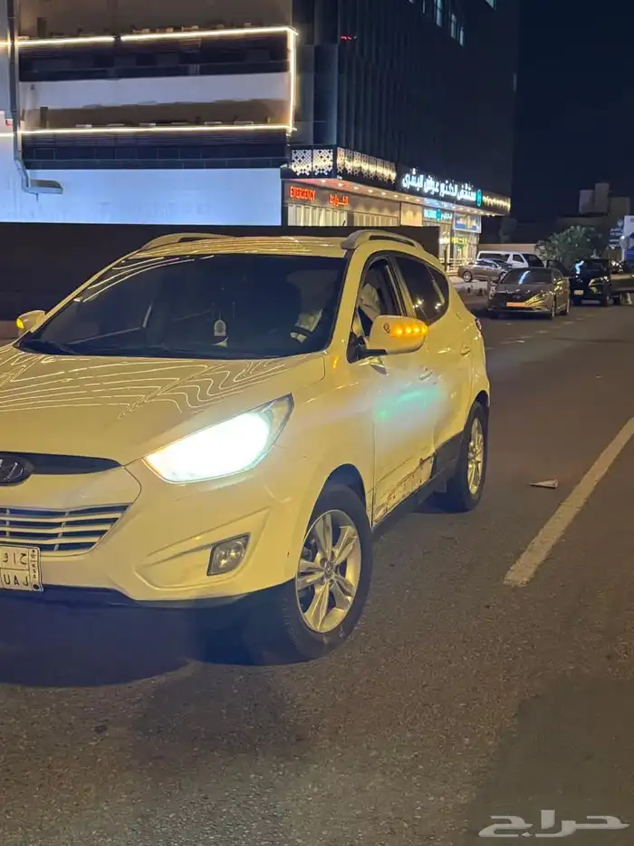 سيارة توسان 2014 ابيض 1