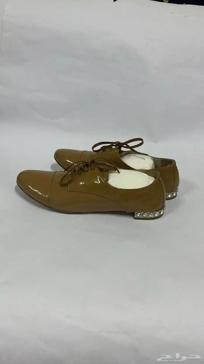 حذاء ماركة ميو ميو miu miu شبه جديد اصلي جلد لميع مقاس 37 0