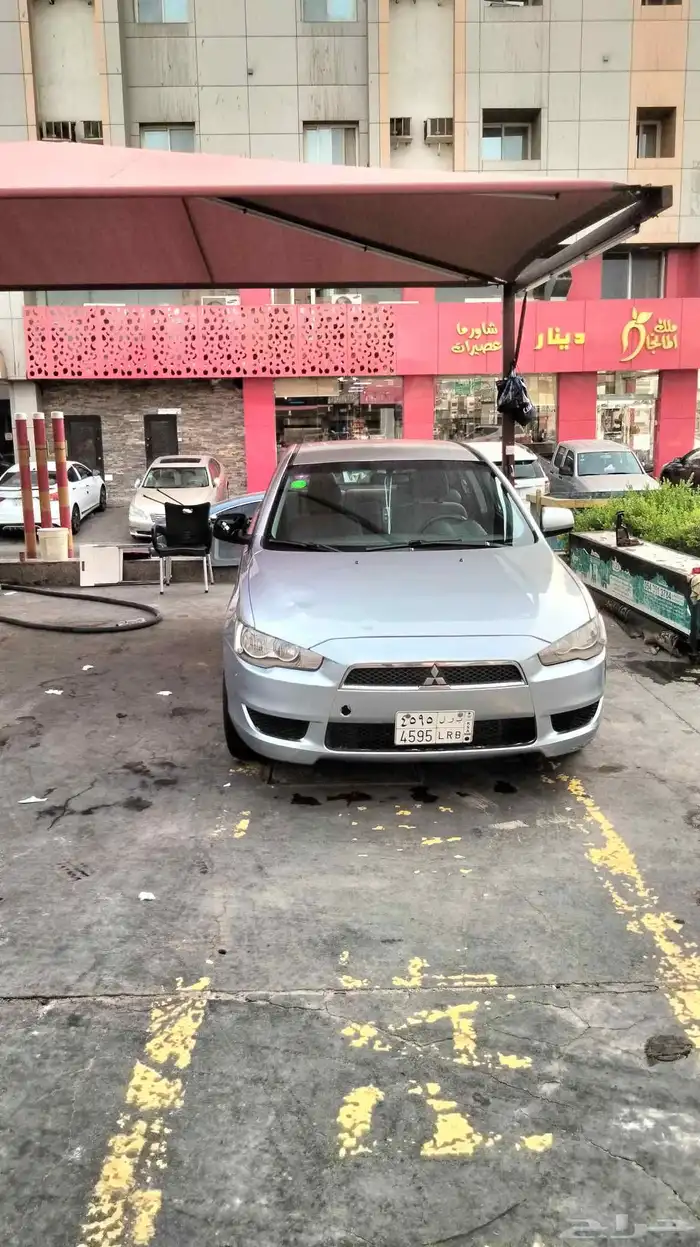 سياره ميتسوبيشي لانسر موديل 2011 3