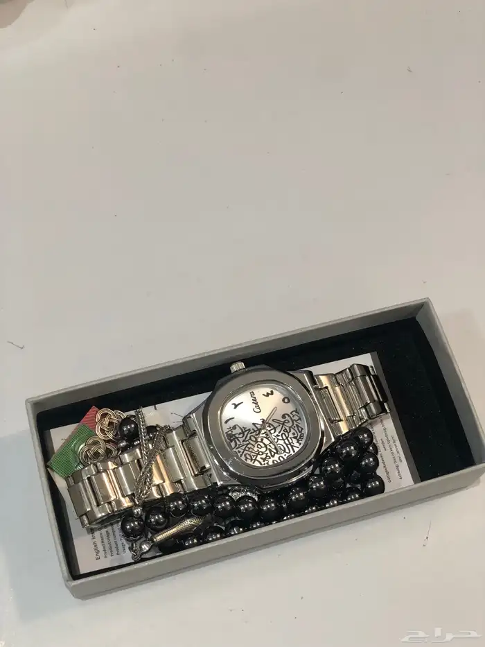 ساعه مع المسبحه 0