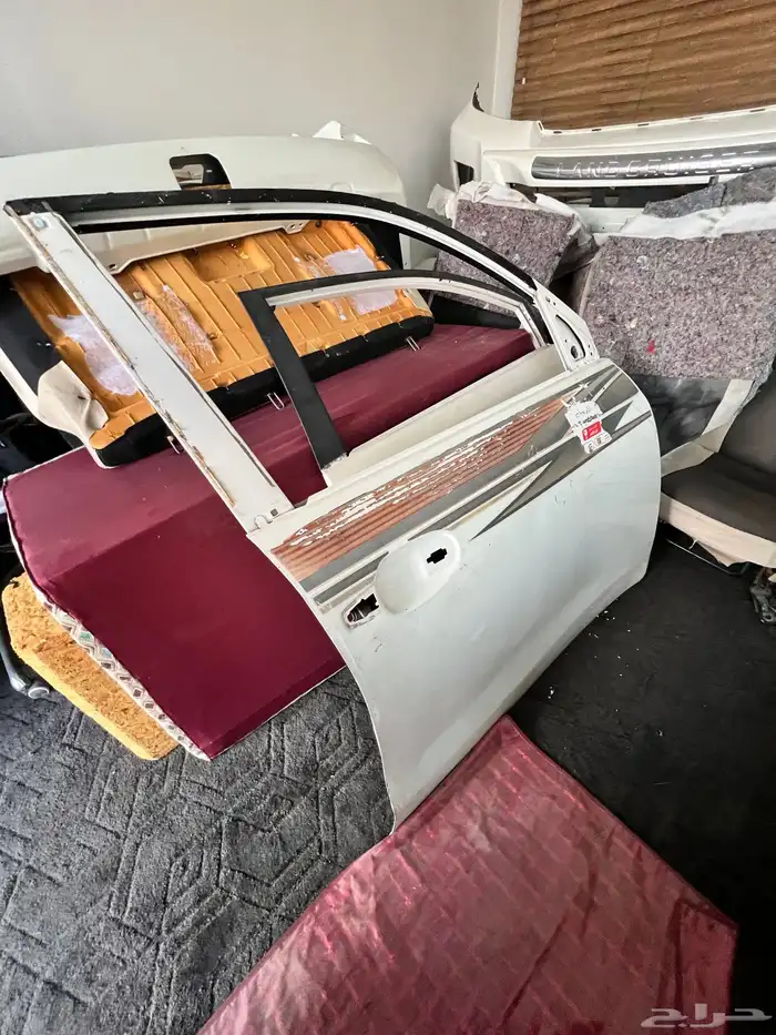 صدام وباب لاندكروزر 5