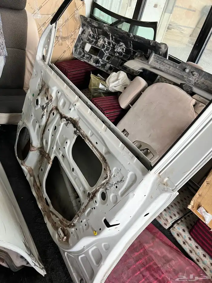 صدام وباب لاندكروزر 6