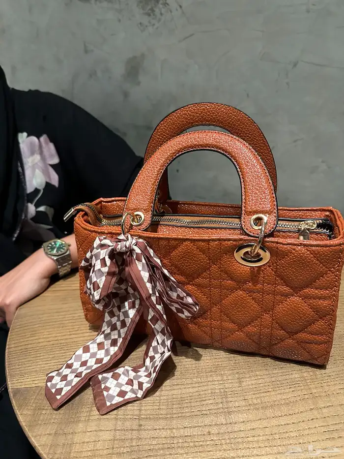 شنطة جديده بقراطيسها 2