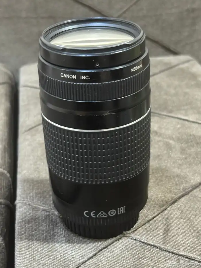 عدسه كانون 75-300 4