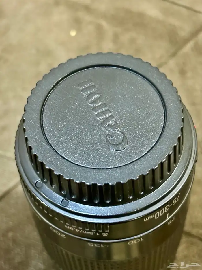 عدسه كانون 75-300 1