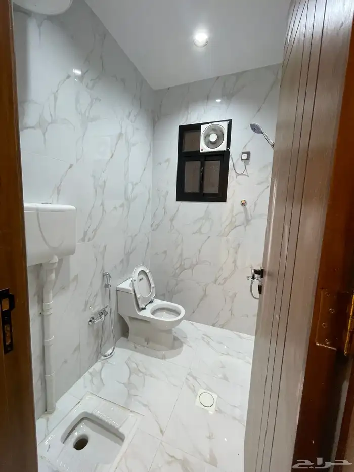 للبيع شقه دور أرضي مع حوش وسيع وبايكه خميس مشيط 11