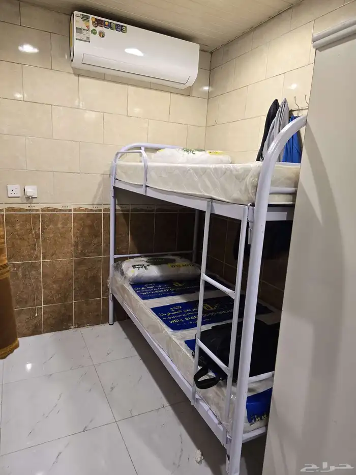 تجهيز سكن العمال سرير حديد دورين دور واحد مراتب بطانيه دولاب 2