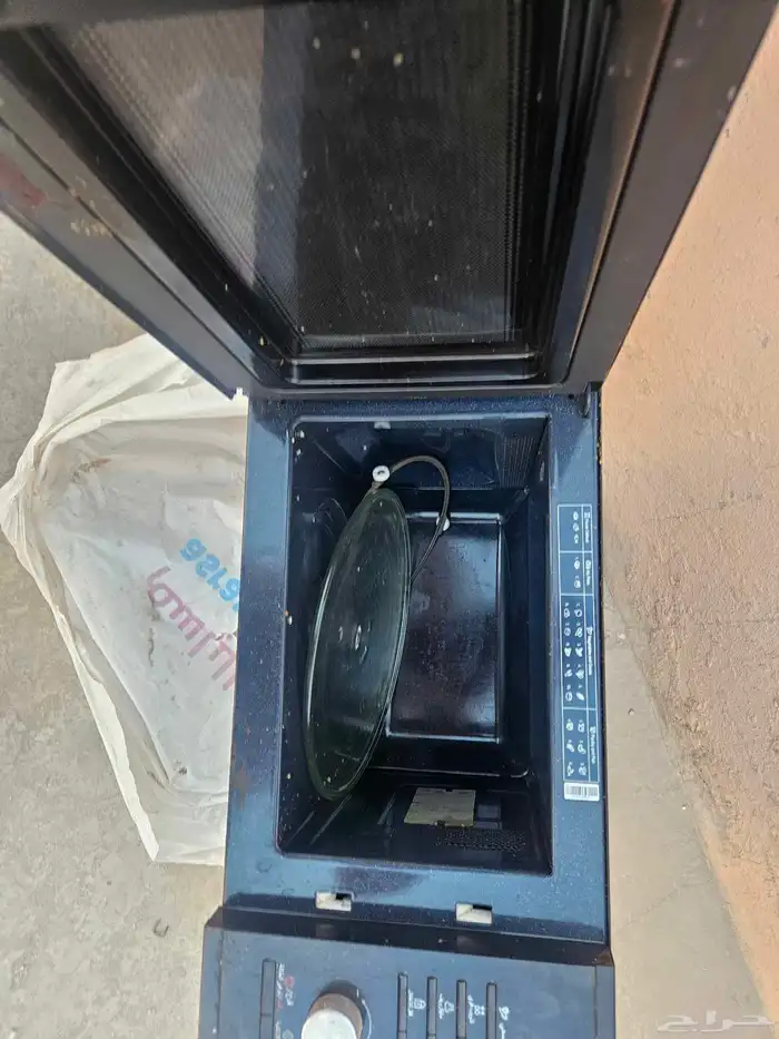 للبيع متفرقات سيارة اطفال ومايكرويف ومكنسة كهربائية 1